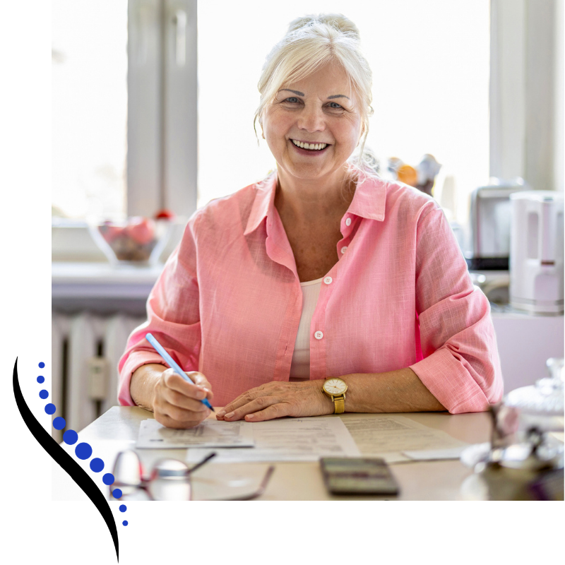 older woman filling out paperwork